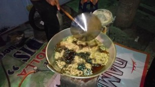 'Malang street food ; FRIED EEL WITH VEGETABLE AND RICE [lalapan belut araya]'