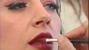 'Applying Lipstick for High Fashion Makeup'